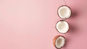 Coconut fruit top view on the pastel background photo