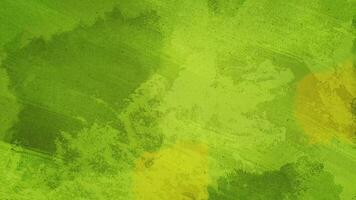 a green and yellow abstract background with a paint brush video