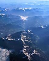 Aerial view of Alps, mountain range, stunning landscape scenery, travel and adventure background, flying over Alps video