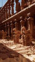 A stone building with pillars and pillars in the middle of it video