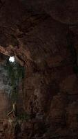 A cave with a light coming from it video