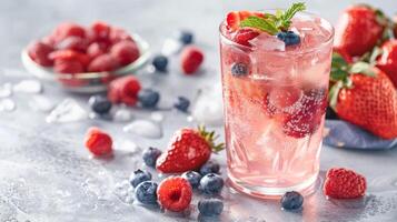 Refreshing Drink With Strawberries and Blueberries photo