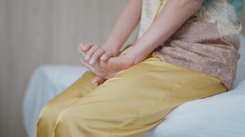 Woman sitting on the bed stretching her arms in the morning to get up early to go to work video