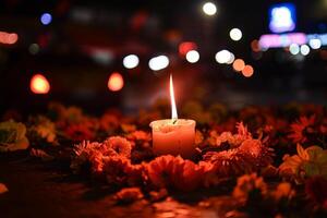 ardiente vela y flores monumento para víctimas de violencia o accidente foto