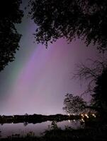 Northern lights, Aurora Borealis above Galway city in Ireland, nature background, night sky wallpaper photo