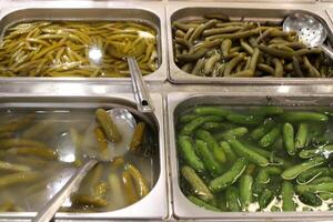 Pickled and salted vegetables are sold at a city bazaar in Israel. photo