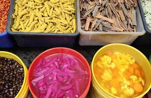 Pickled and salted vegetables are sold at a city bazaar in Israel. photo