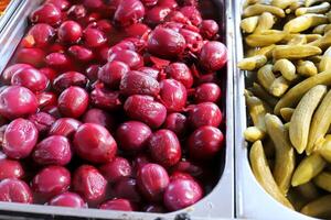 Pickled and salted vegetables are sold at a city bazaar in Israel. photo