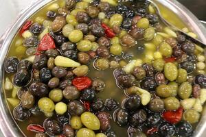 Pickled and salted vegetables are sold at a city bazaar in Israel. photo