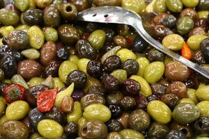 Pickled and salted vegetables are sold at a city bazaar in Israel. photo