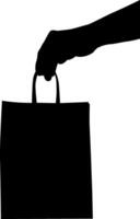 Silhouette of a woman with a shopping bag. vector