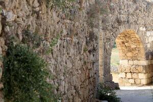 An ancient aqueduct for supplying water to populated areas. photo