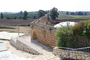 An ancient aqueduct for supplying water to populated areas. photo