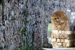 An ancient aqueduct for supplying water to populated areas. photo