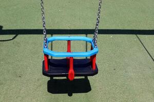 Items for games and sports on the playground in the city park. photo