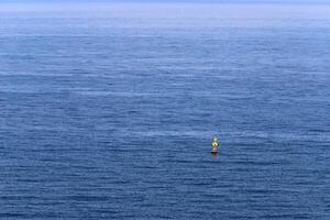 The color of water in the Mediterranean Sea in shallow water. Natural abstract background. photo