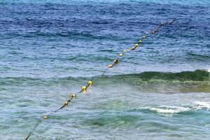 The color of water in the Mediterranean Sea in shallow water. Natural abstract background. photo