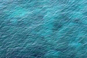 The color of water in the Mediterranean Sea in shallow water. Natural abstract background. photo