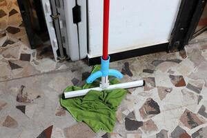 Hand tools for wet cleaning of premises photo