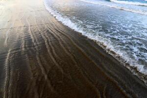 Sandy beach on the shores of the Mediterranean Sea in northern Israel. photo