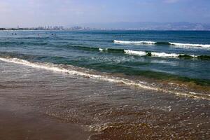 Sandy beach on the shores of the Mediterranean Sea in northern Israel. photo