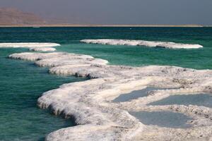 The Dead Sea is a closed, endorheic body of water in the Middle East between Israel and Jordan. photo