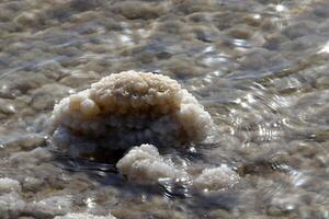 The Dead Sea is a closed, endorheic body of water in the Middle East between Israel and Jordan. photo