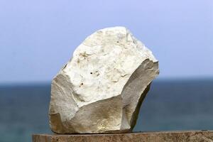 Stones in a city park on the shores of the Mediterranean Sea. photo