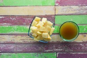 Sugarcane juice on a table photo