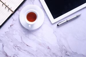 Top view of digital table with empty screen on white background photo