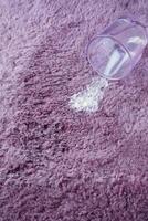 spill milk on a carpet top view , photo