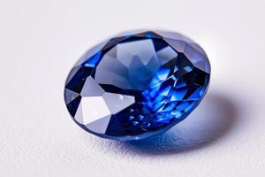 A blue diamond is shown in a close up photo