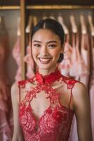 Portrait of a beautiful and sexy female model girl with brown black hair wearing red lace lingerie dress photo