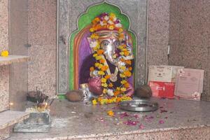 Outdoor shrine of Ganesha, elephant god of beginnings photo