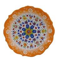 Brightly colored porcelain dishes from pottery factory photo