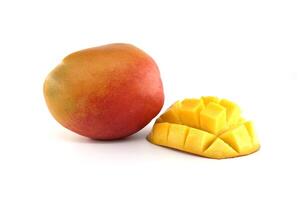 Cubed mango pieces and ripe mango fruit on white photo