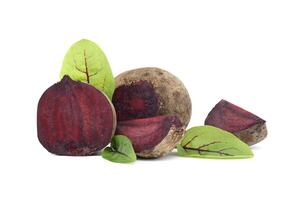 Slices of beetroot and fresh green leaves isolated on white photo