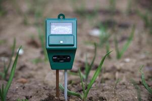 Soil moisture meter determine the conditions of the environment photo