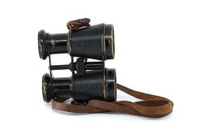 Binoculars with brown leather straps isolated on white photo