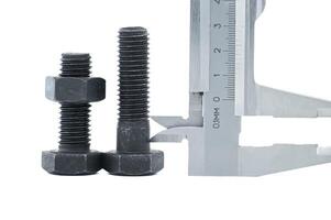 Hex head bolt and nut measured by caliper over white photo