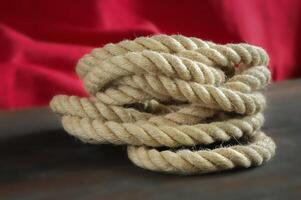 Coil of rope made of hemp or jute, braided texture photo