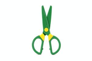 Safety plastic scissors for paper cut art craft isolated on white background photo