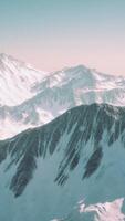 Snow covered beautiful mountain peaks video