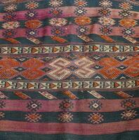 Turkish kilim with natural colors in traditional patterns photo