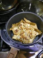 Crisping dim sum shumai in an air fryer photo