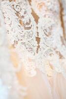 beautiful wedding dress close-up details of wedding lace photo