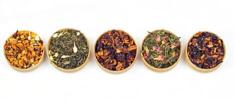 different types of tea on a white background. a kind of delicious fruit tea. photo