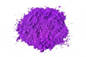 a bunch of dry natural purple pigment on a white background macro photo