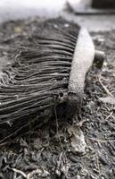 Old dirty broom photo