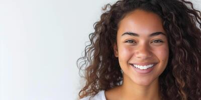 Young black African American woman smiling with copy space. Happiness, dark skin tone, white teeth, smooth skin, natural beauty, joyful concept photo